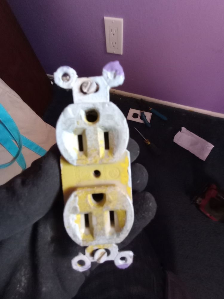 A burnt outlet pulled from the wall