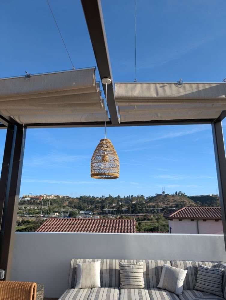 Covered patio with pendant light